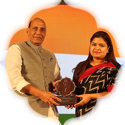 Politician & Animal Advocate Poonam Mahajan receiving the Devi Award from Union Minister Rajnath Singh in Delhi.