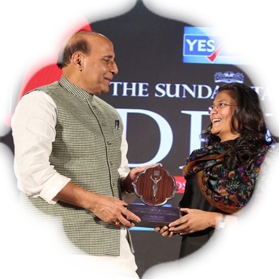 Union Minister Rajnath Singh and Politician & Social Campaigner Sushmita Dev share a light moment while she receives the Devi Award in Delhi.