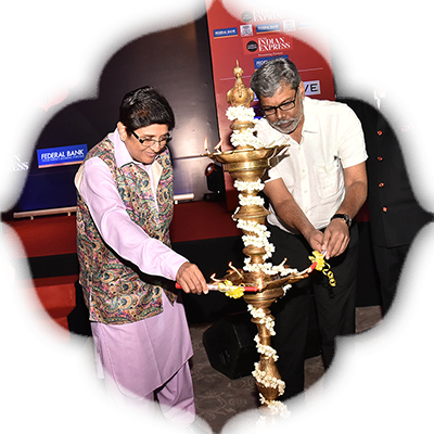 Lt Governor Kiran Bedi lights the lamp with TNIE editor G S Vasu as Harsh Dugar, Head of Corporate and Institutional Banking at Federal Bank and Prabhu Chawla, TNIE editorial director, look on