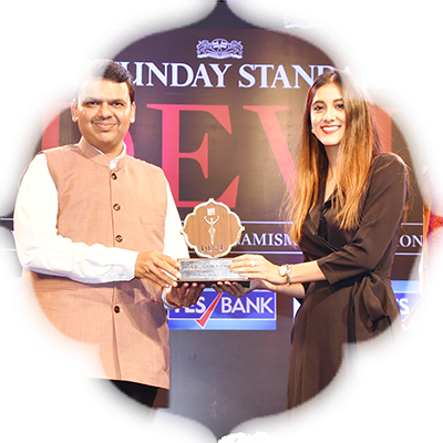 Humans of Bombay founder Karishma Mehta receives her award from the CM