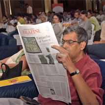 Professor Jatin Nayak reading The Sunday Express Magazine, a sister publication of The New Indian Express, during the Odisha Literary Festival 2019