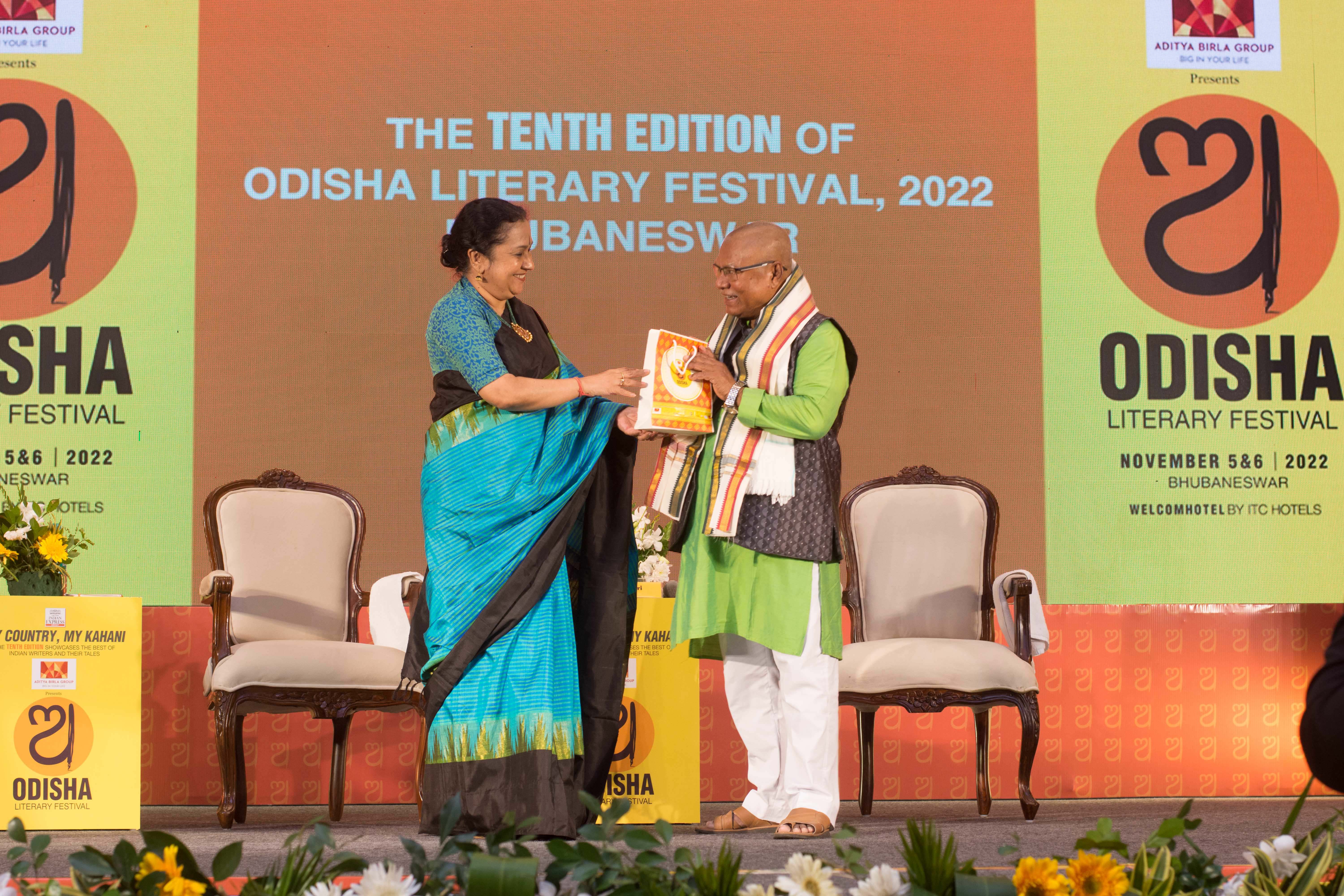 Left to right - TNIE CEO Lakshmi Menon and Manoranjan Byapari, author and politician diring the third session - From Rickshawala to MLA: How I Rewrote My Life, on the first day of Odisha Literary Festival in Bhuabneswar. Express / DEBADATTA MALLICK