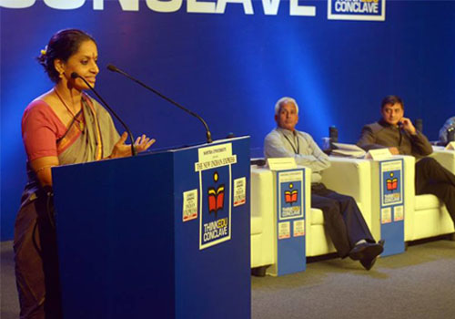 Lata Shenava speaks as panelists P Kanagasabhapathi, Sanjeev Sanyal and Shiv Visvanathan (extreme right) look on
