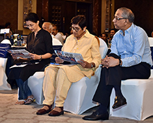 Dr Kiran Bedi, Lt Governor of Puducherry, and actor educator Gautami Tadimalla read TNIE as CMD Manoj Sonthalia looks on