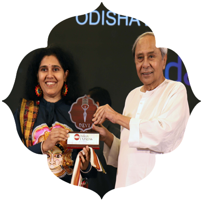  Former Chief Minister Naveen Patnaik presenting Odisha Devi Awards to Anita Sabat