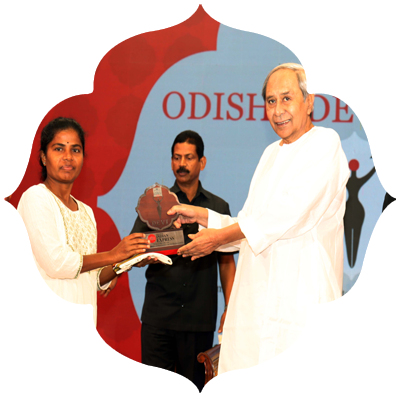 Former Chief Minister Naveen Patnaik presenting Odisha Devi Awards to Jayanti Buruda