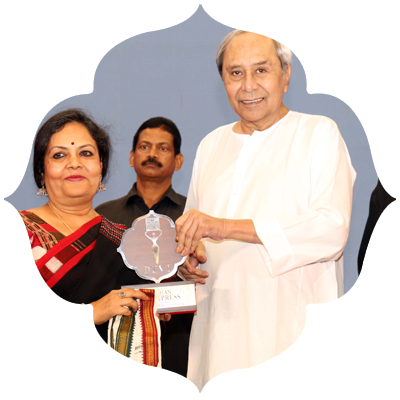 Former Chief Minister Naveen Patnaik presenting Odisha Devi Awards to Poly Patnaik