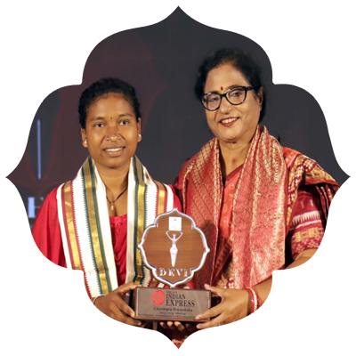 Champa Raspeda receving the Devi Awards