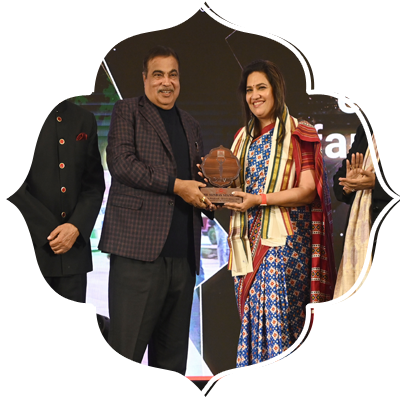 Union Road, Transport and Highways minister Nitin Gadkari and Delhi CM Rekha Gupta present Devi award to Smita Prakash (Editor and CEO, ANI).