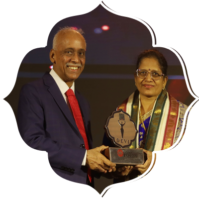 Dr Palukuri Lakshmi, Surgeon, Champion of Surgical Excellence receiving the award.