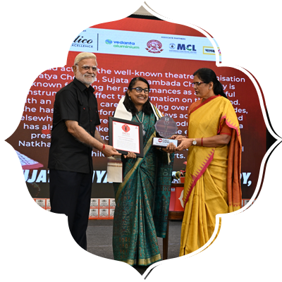 Theatre actor Sujata Priyambada receives the Devi Award.