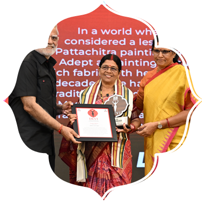Pattachitra artist Laxmi Meher receives the Devi Award.